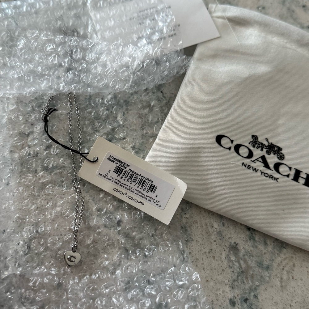 Brand new Coach necklace